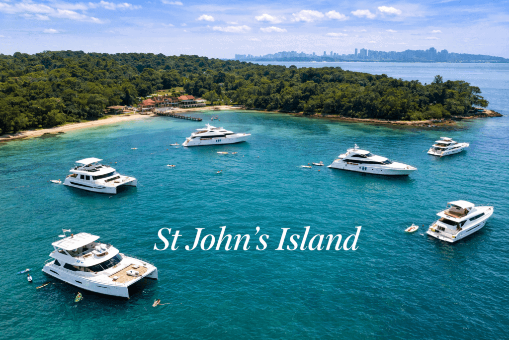 Elegant yachts anchored near St John’s Island, Caribbean paradise.